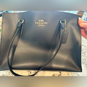 Black and red authentic Coach bag. Fits standard laptop. Perfect condition.